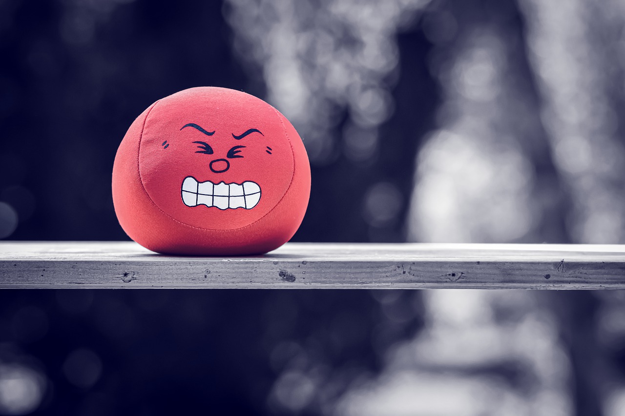 A red ball with an angry face